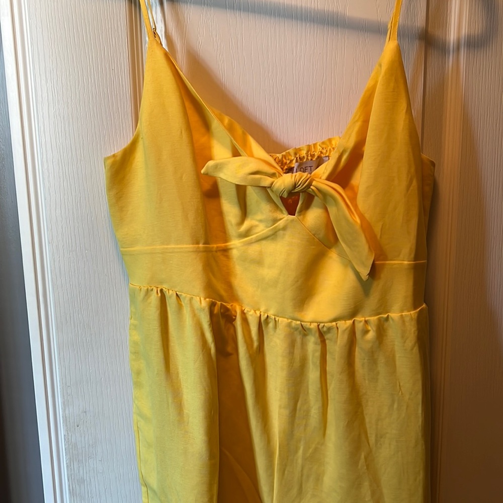 Loft. New with tags. Size 12. Linen. Bright yellow jumpsuit. Pockets!